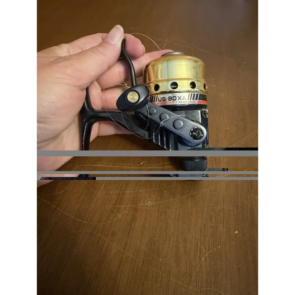 Vintage Daiwa US-80XA Spincast Fishing Reel - Gold & Black Micro Adjustable Drag